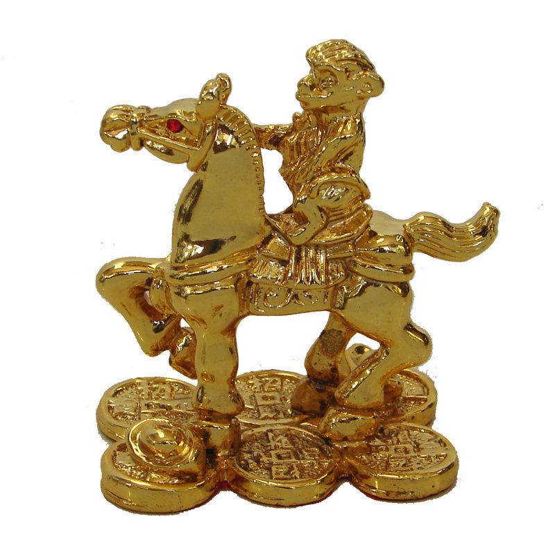 Figurine singe sur cheval