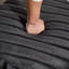 Repose-pieds rembourré en fausse fourrure-760395920