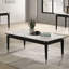 Table basse de style contemporain avec plateau en pierre frittée et pieds en flèches argentées avec finition noire et blanche