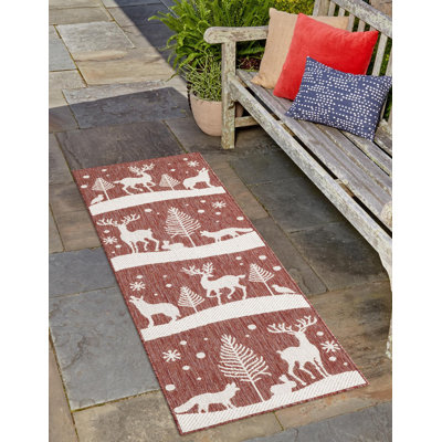 Le tapis Holiday Aisle® Kareema