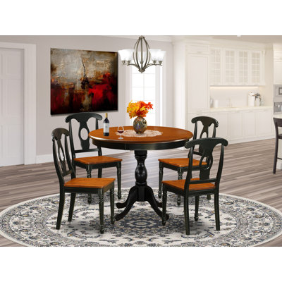 5-Piece Dining Set consists of a Mid Century Table and 4 Kitchen Chairs with Napoleon Back - Black Finish