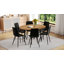 Ensemble de table et de chaises. Table de salle à manger extensible moderne. Convient pour des rassemblements de différentes tailles. Combiné avec 4 chaises en polyuréthane artificiel noir avec un design de coussin incurvé.