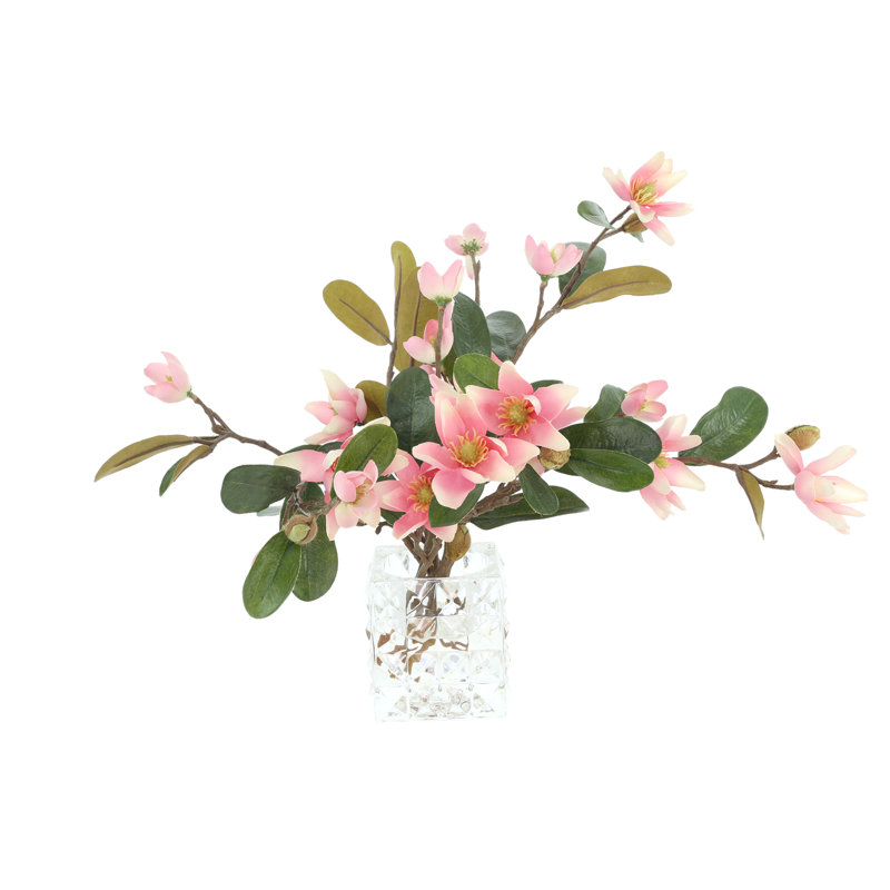 Magnolias disposés dans un vase en verre, Rose / vert / brun