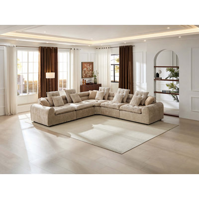 Canapé d'angle modulaire en laine d'agneau noire moelleuse de 316 cm (124,3 po), avec assise profonde et confortable, et coussins décoratifs pour le salon.