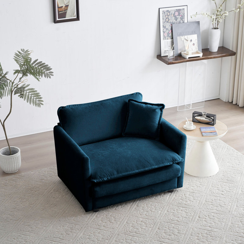 Fauteuil en chenille bleu pour se détendre