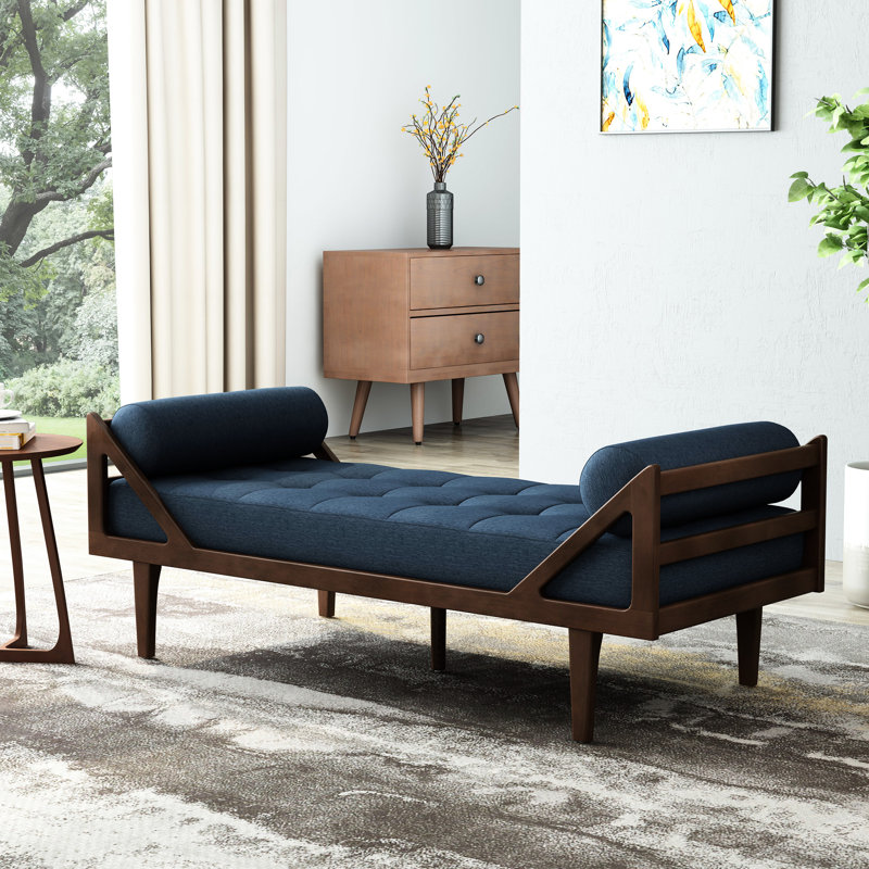 Chaise longue confortable en tissu bleu marine avec une base lisse au look contemporain et piqué gaufré