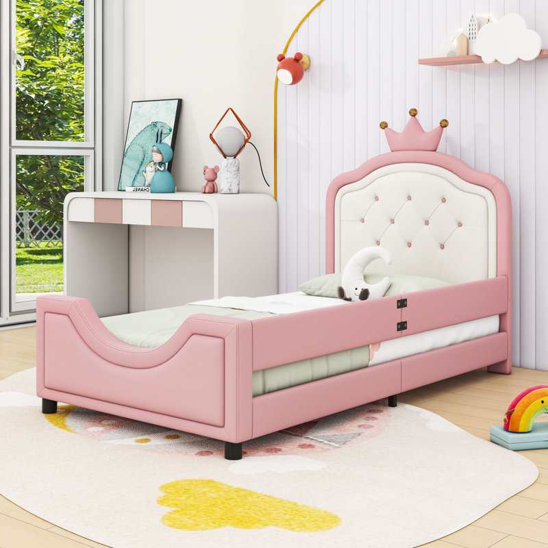 Lit plateforme simple tapissier avec tête de lit couronne