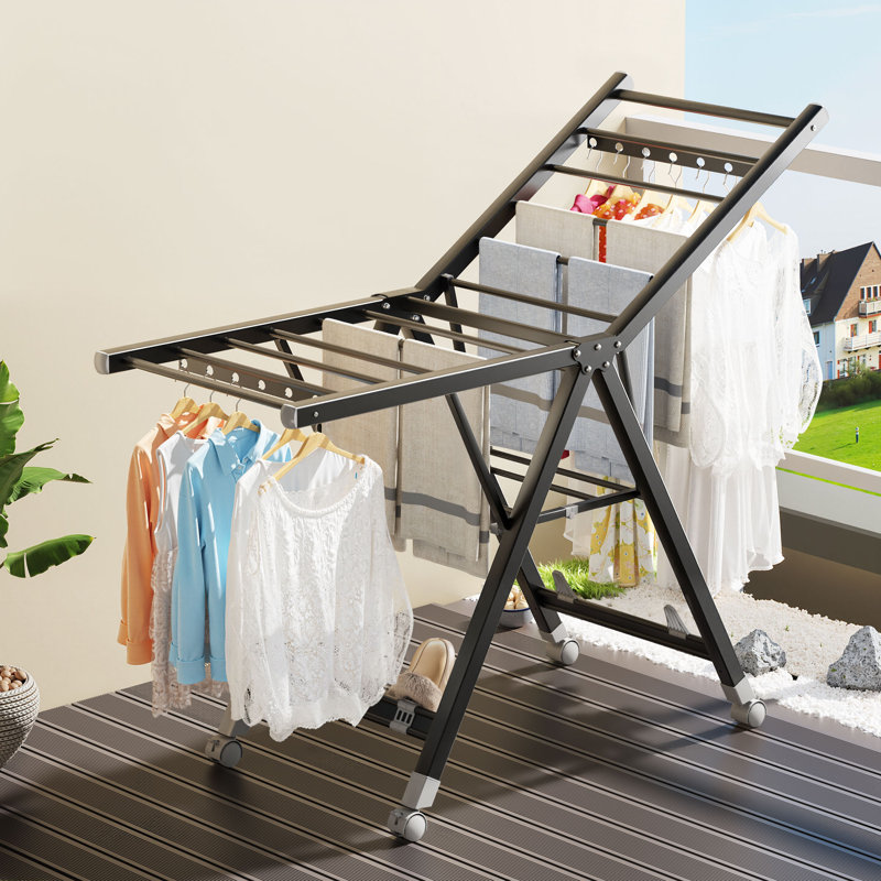 Étendoir à linge pliable noir de grande capacité JOBOS avec roues, hauteur de séchage réglable, trous coupe-vent et étagère à chaussures.