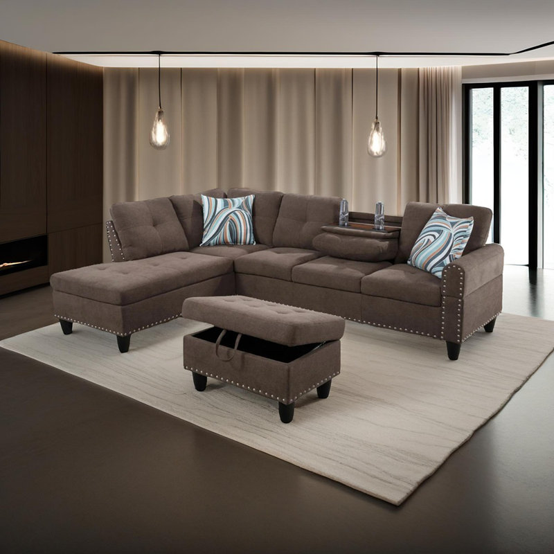 Canapé modulaire en tissu brun avec repose-pieds