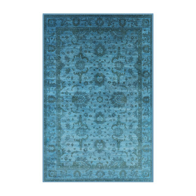 Tapis bleu sarcelle à motif oriental