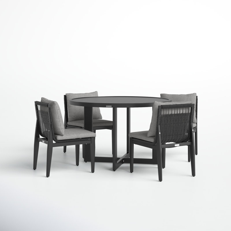 Trosclair Round 4 - Person 48'' Long Dining Set with Cushions