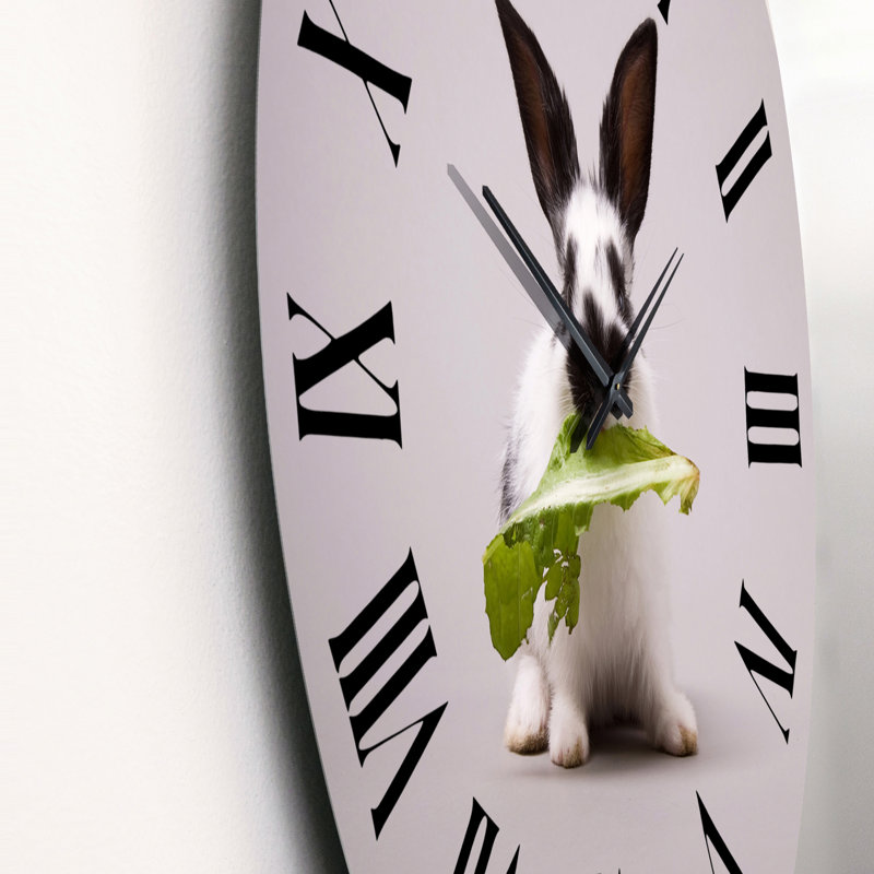 Horloge murale traditionnelle lapin noir et blanc avec feuille verte, Moyen
