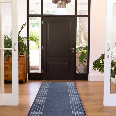 Tapis bleu touffeté à motif géométrique Everino