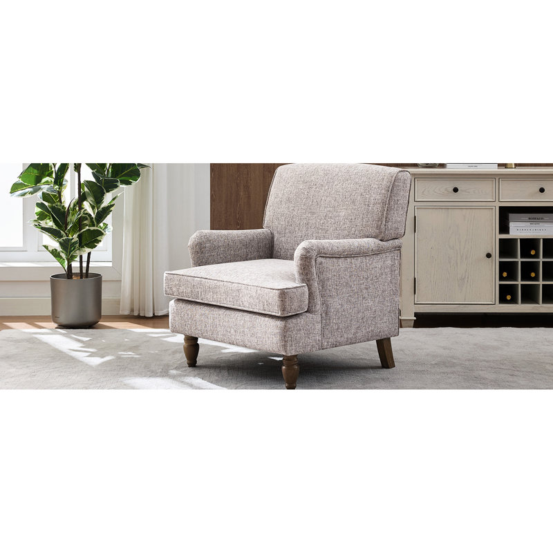 Fauteuil crème rétro avec revêtement en lin et pieds tournés en bois d'hévéa antique, pour lire un magazine dans un livre rembourré confortable