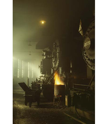 " Photo Of Fronts Of Steam Engine Locomotives On Factory Floor "