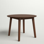 Iyad Extendable Round Solid Wood Dining Table