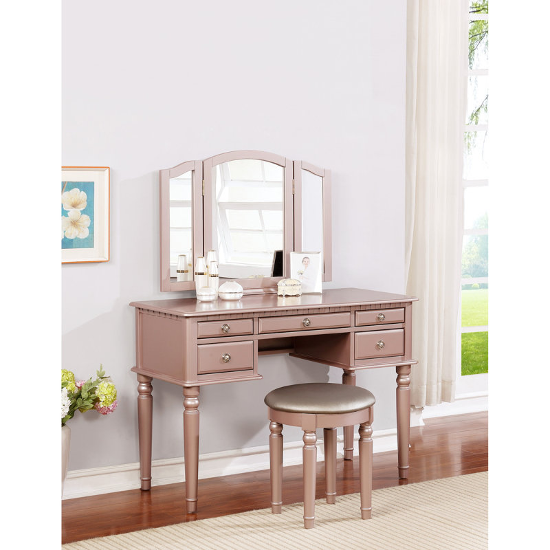 Meuble-lavabo de style contemporain Azaleh pour la chambre à coucher, finition or rose, miroir pliable, cinq tiroirs et un tabouret rond rembourré gris, chambre en bois d'hévéa avec couleur, rangement en bois massif