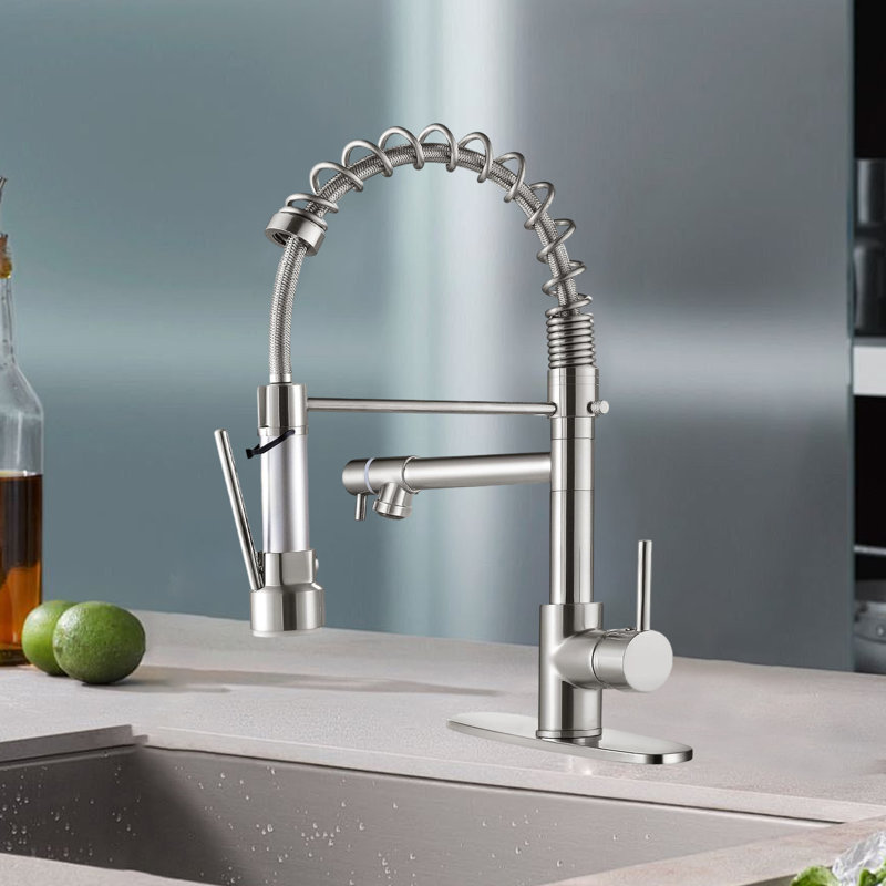 The Kitchen Faucet Features A Pull-Down Sprayer, Stainless Steel Single Handle, And A Spring Kitchen Faucet With A Sprayer.