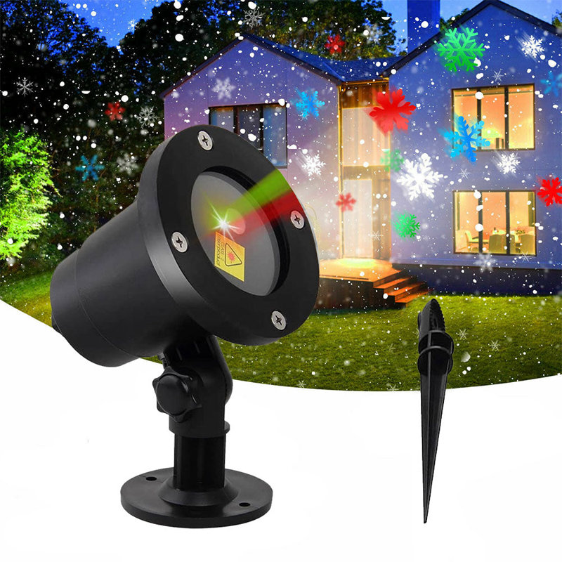 Projecteur de flocons de neige en mouvement et lumières stroboscopiques