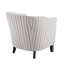 Fauteuil demi-tonneau rembourré à rayures