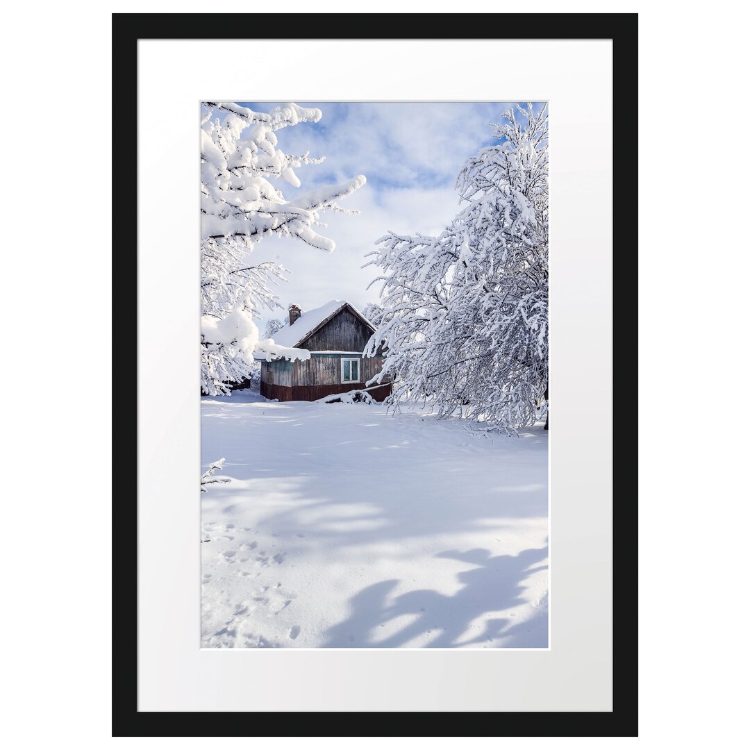 Gerahmtes Poster Winterlandschaft mit Hütte