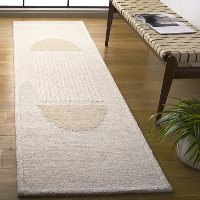 Tapis ivoire / beige en laine / coton touffeté à la main Anvit Rodeo Drive
