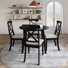 Ensemble de salle à manger 5 pièces avec table ronde noire et chaises en X rembourrées à dossier haut