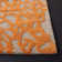 Tapis gris / orange en laine crocheté à la main Rigsby