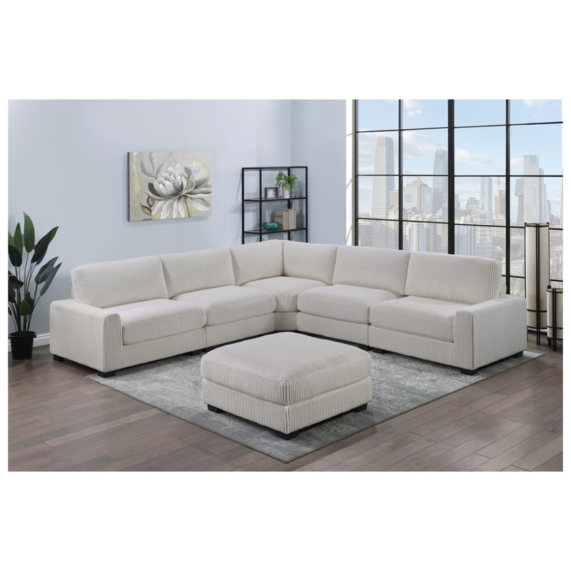 Fauteuil d'appoint en velours côtelé beige avec détails larges et pieds en bois
