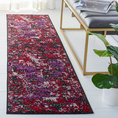 Tapis abstrait noir / mauve