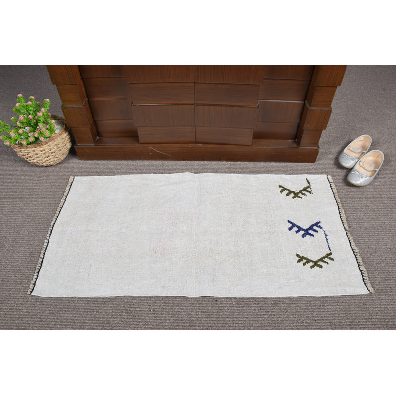 Vintage Turkish Door Mat Features Handwoven Design with Minimalist White and Arrow Motifs