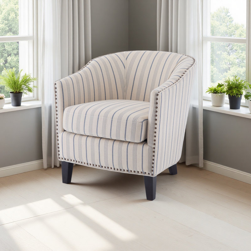 Fauteuil demi-tonneau rembourré à rayures