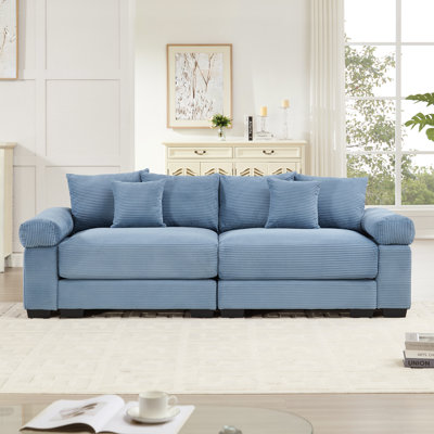 Canapé modulaire rembourré avec accoudoirs épais et coussins Mykala