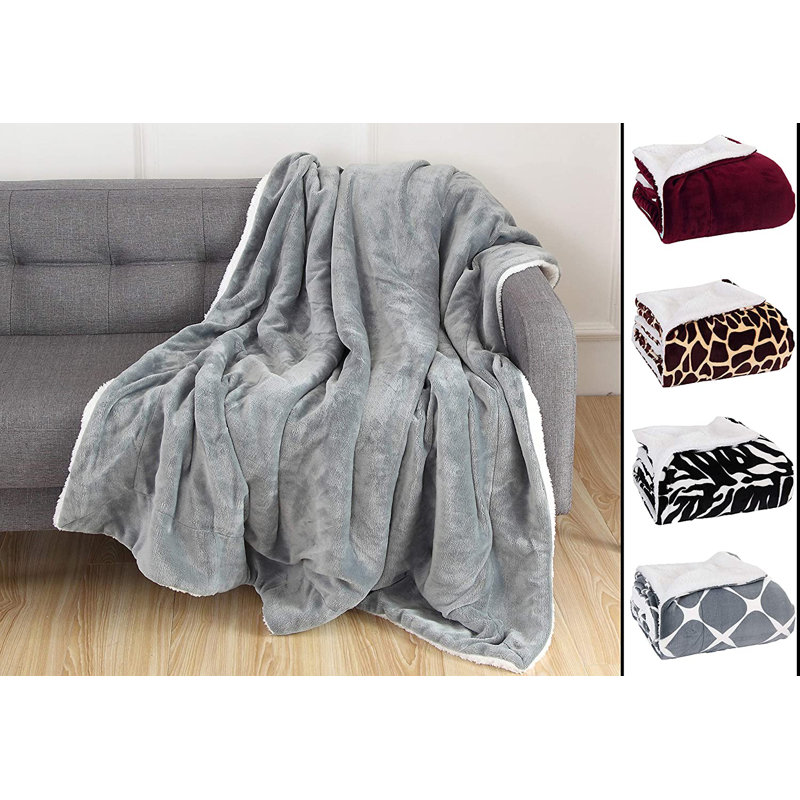 Jeté en molleton chaud et confortable Mocassi Holiday, gris