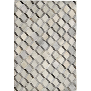 Tapis gris/crème vache fait main géométrique Stamant