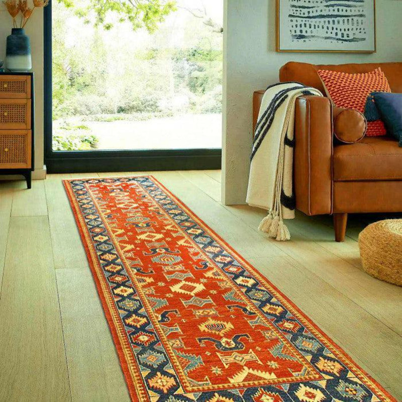 Vrishin Southwestern Area Rug in Rust
