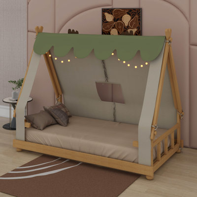 Lit simple avec tente et lumière