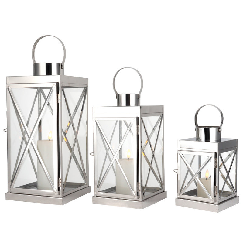 Ensemble de trois porte-bougies de table en acier inoxydable et verre transparent et argent
