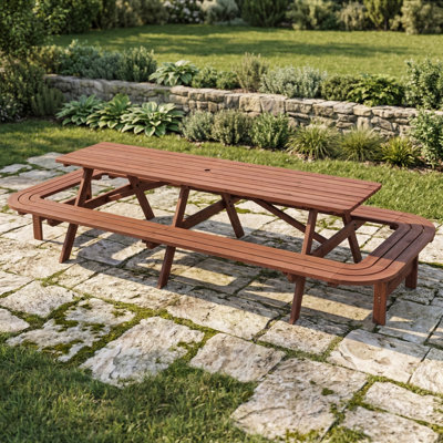 Large outdoor wooden picnic table with attached benches, finished in brown. Seats 14 to 16 persons. Nearly 8 feet long, rectangular shape. Includes an umbrella hole. Suitable for patios, gardens, and backyards.