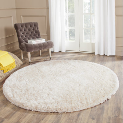 Delane Handmade Shag Champagne Area Rug