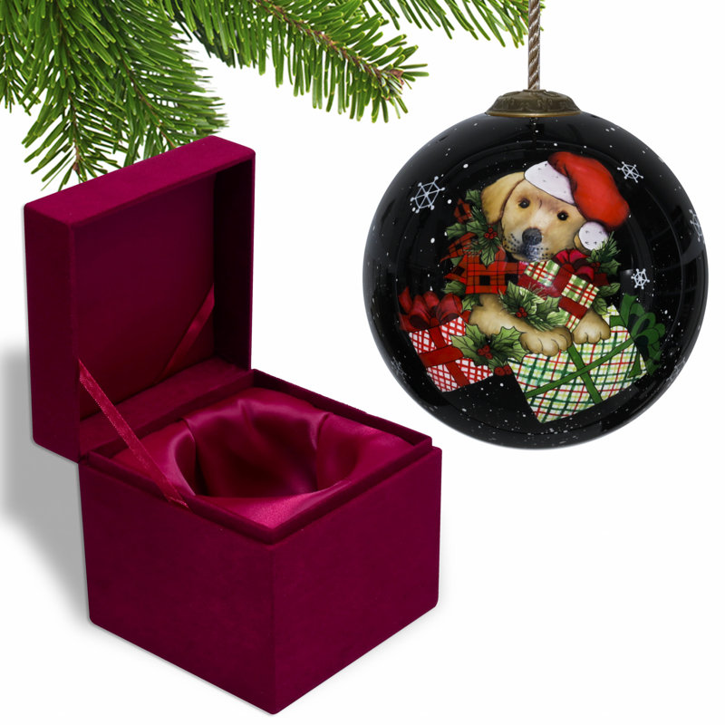 Ornement boule de Noël avec des cadeaux