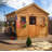 12 ft. W x 16 ft. D Cedar Wood Sunshed Garden Shed with Metal Roof