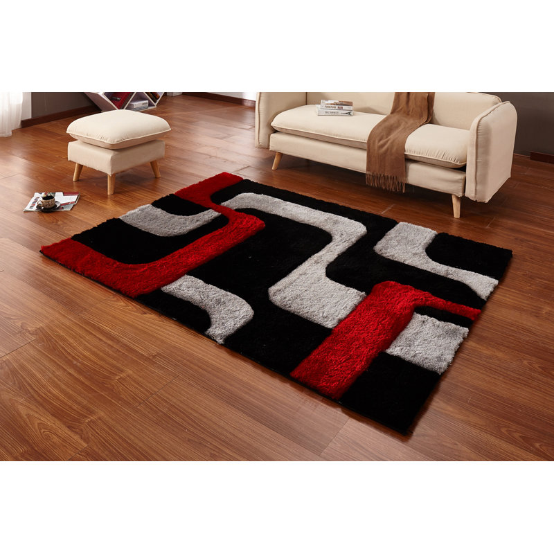 Tapis de zone noire abstraite Regina