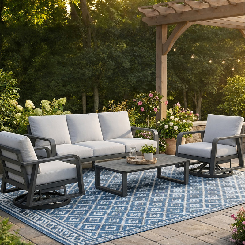 Un canapé trois places + deux chaises pivotantes + une table basse