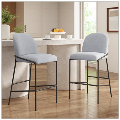 Tabouret de bar intérieur en métal Galen, finition bronze antique avec tissu gris, durable et élégant pour les intérieurs modernes