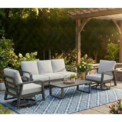 FR Un canapé trois places + deux chaises pivotantes + une table basse
