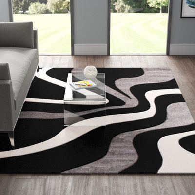 Tapis noir Alyta