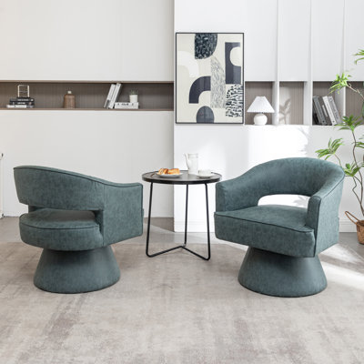 Fauteuil demi-tonneau pivotant en similicuir Kiersten