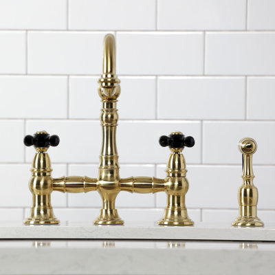 Kingston Brass Duchess Two-Handle 4-Hole Deck Mount Bridge Kitchen Faucet with Brass Side Sprayer