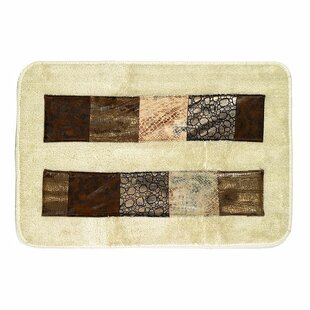 https://assets.wfcdn.com/im/33422272/resize-h310-w310%5Ecompr-r85/4170/41707561/beesley-cotton-blend-non-slip-animal-print-bath-rug.jpg